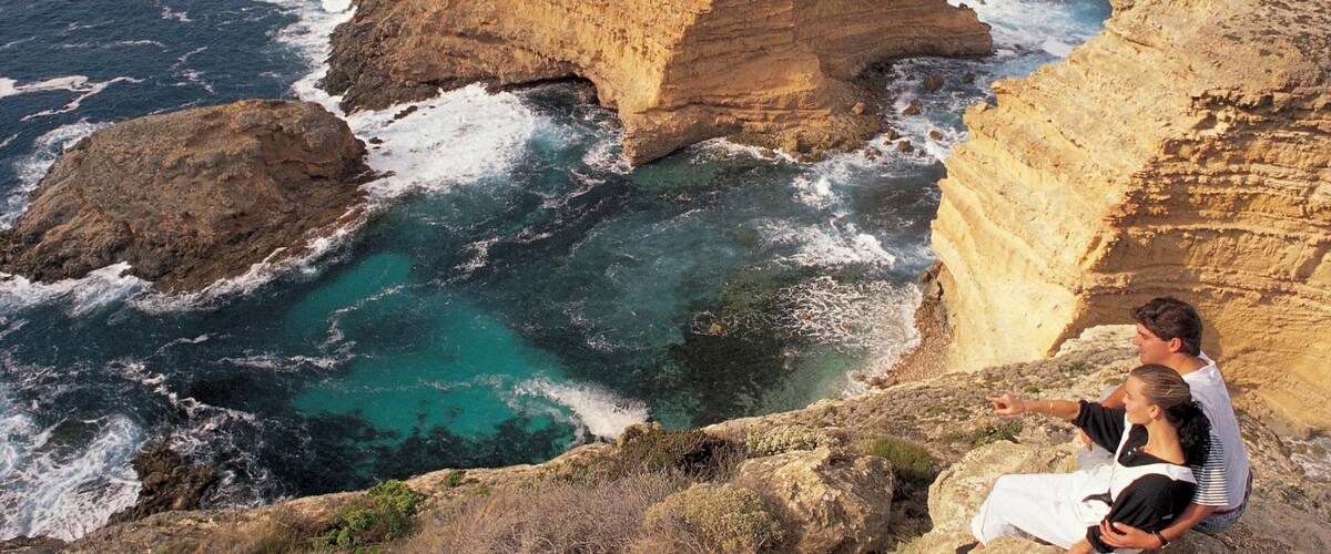 Port Lincoln showing rocky coastline and landscape views as well as a couple