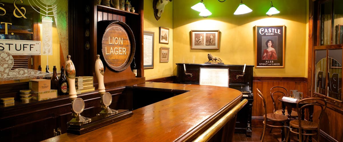 SAB World of Beer featuring a bar and interior views