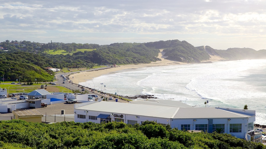 Eastern Beach which includes a coastal town, a sandy beach and general coastal views