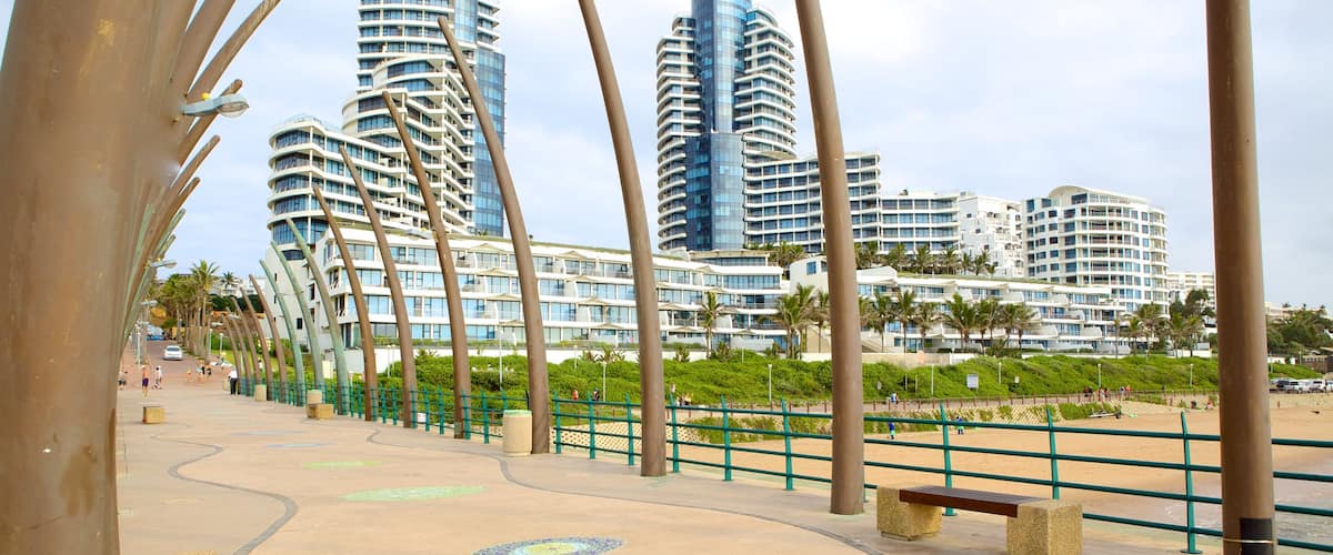 Umhlanga Rocks Beach showing a city, a skyscraper and a hotel