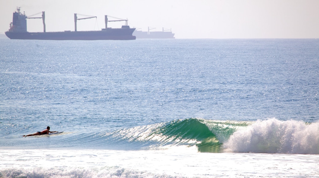 Umhlanga Rocks Beach showing landscape views, surf and surfing