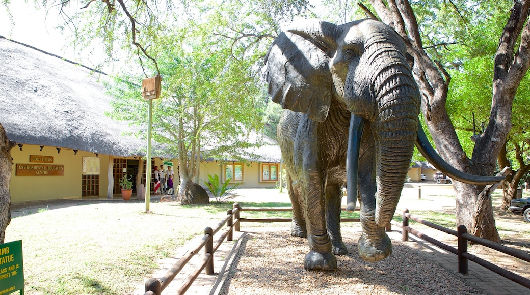 Mpumalanga - Limpopo which includes zoo animals, land animals and a statue or sculpture