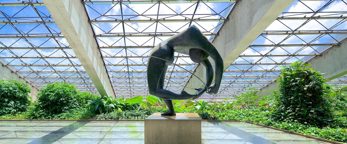 Claudio Santoro National Theater which includes modern architecture, art and a statue or sculpture