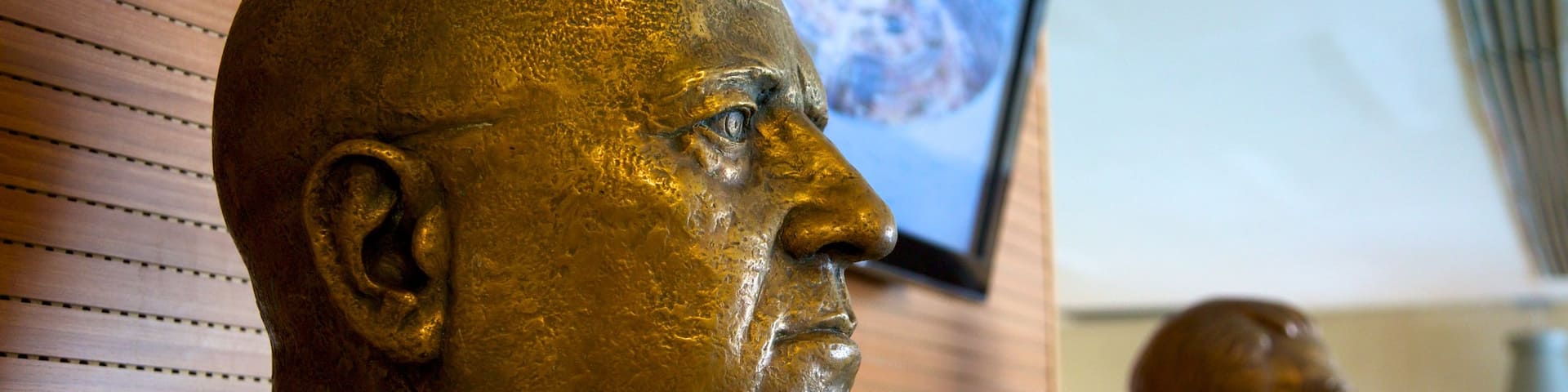 Maracana Stadium featuring a statue or sculpture and interior views