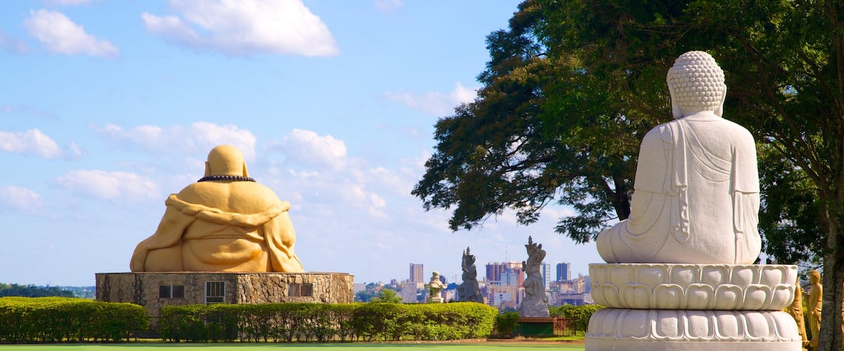 Buddhist Temple showing religious aspects, a temple or place of worship and a statue or sculpture