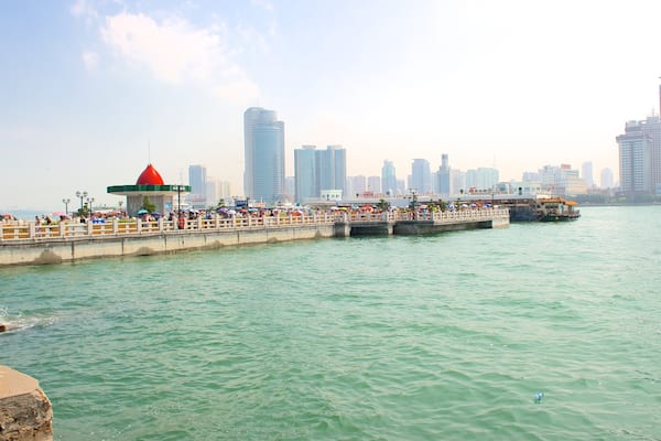 Gulangyu Island featuring a bay or harbour, a high-rise building and a city