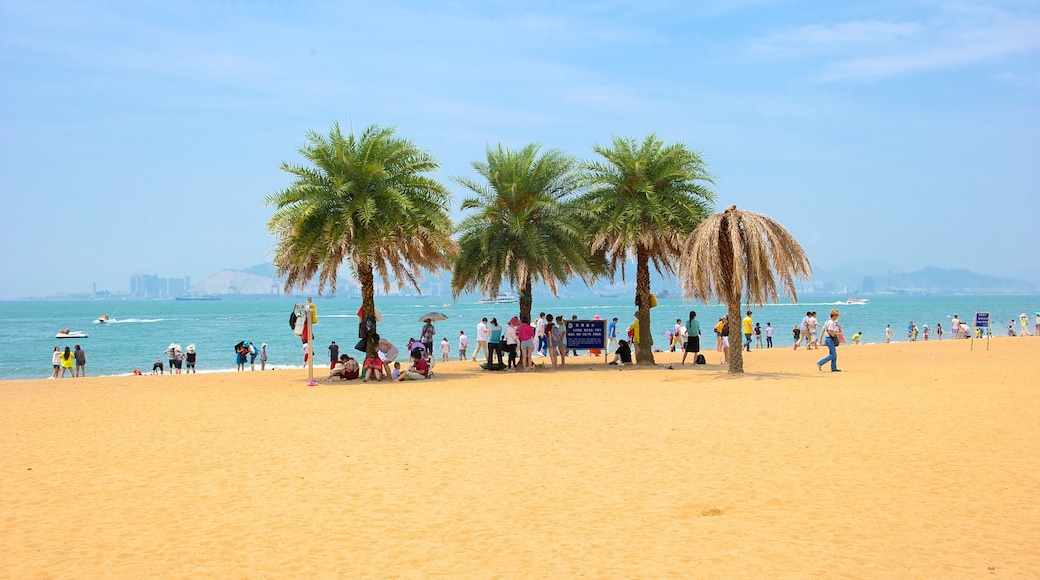 Gulangyu Island which includes a coastal town, tropical scenes and a beach