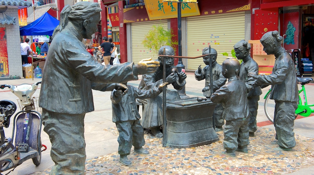 Drum Tower which includes a statue or sculpture, outdoor art and art