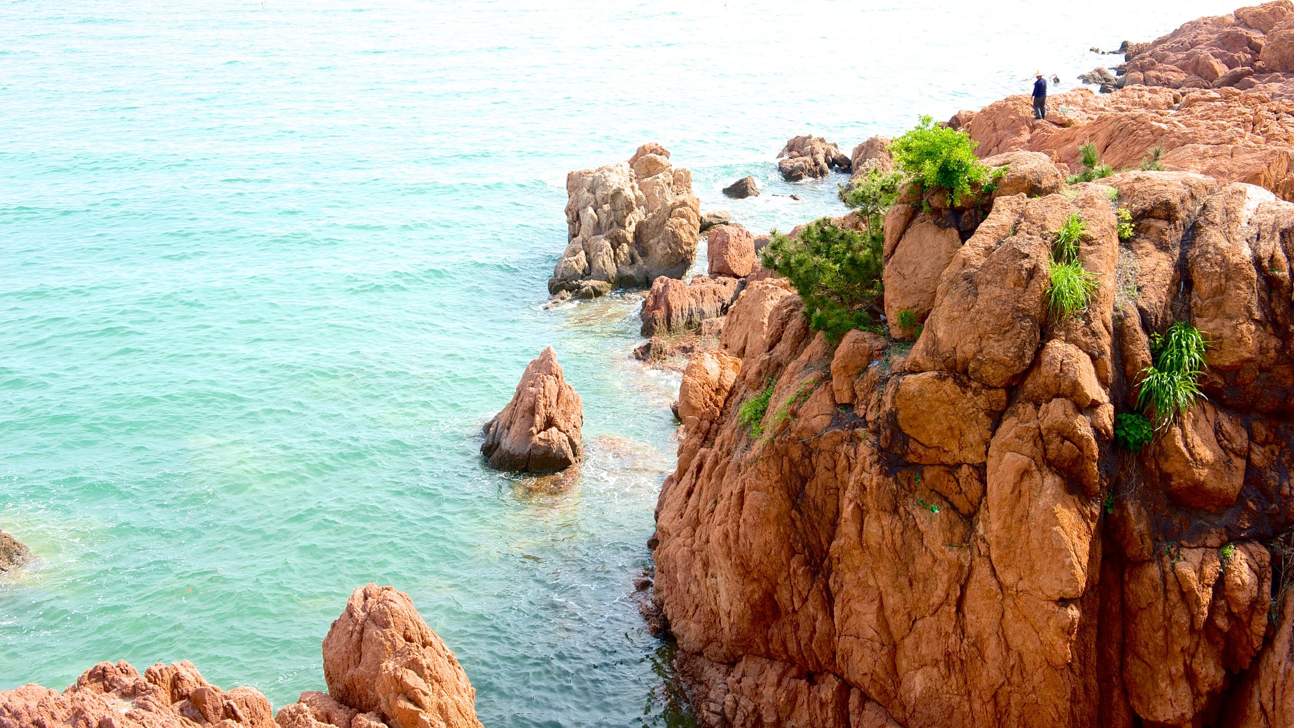 Number 1 Beach which includes rocky coastline