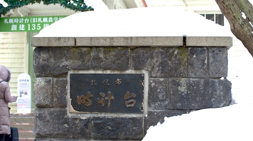 Clock Tower which includes signage