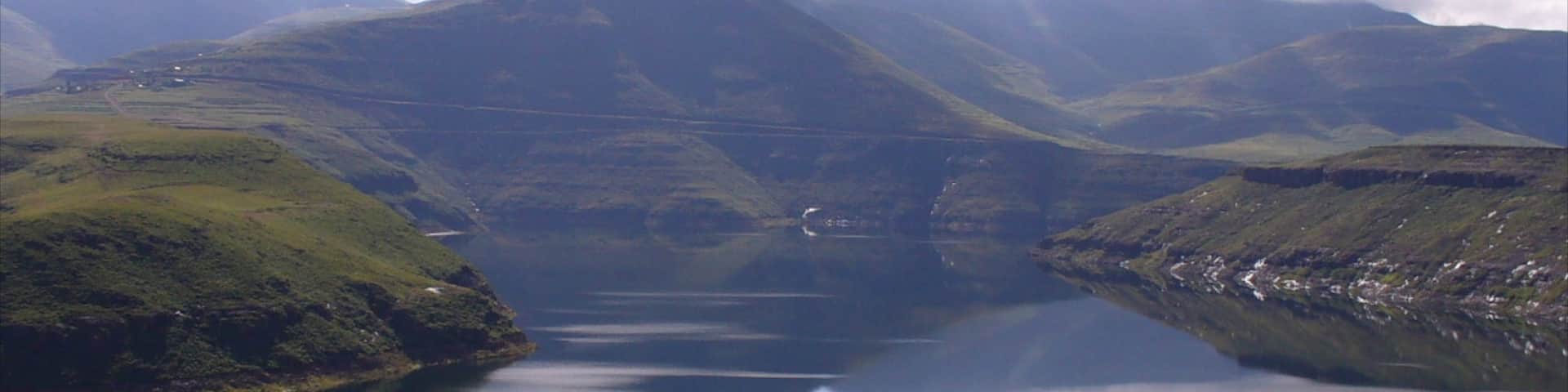 Lesotho which includes landscape views and a lake or waterhole