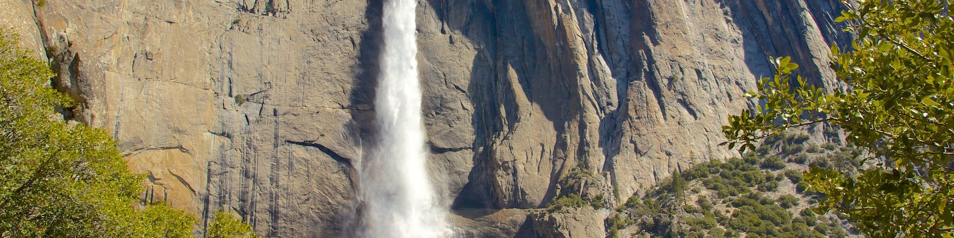 Yosemite Valley featuring a waterfall and mountains