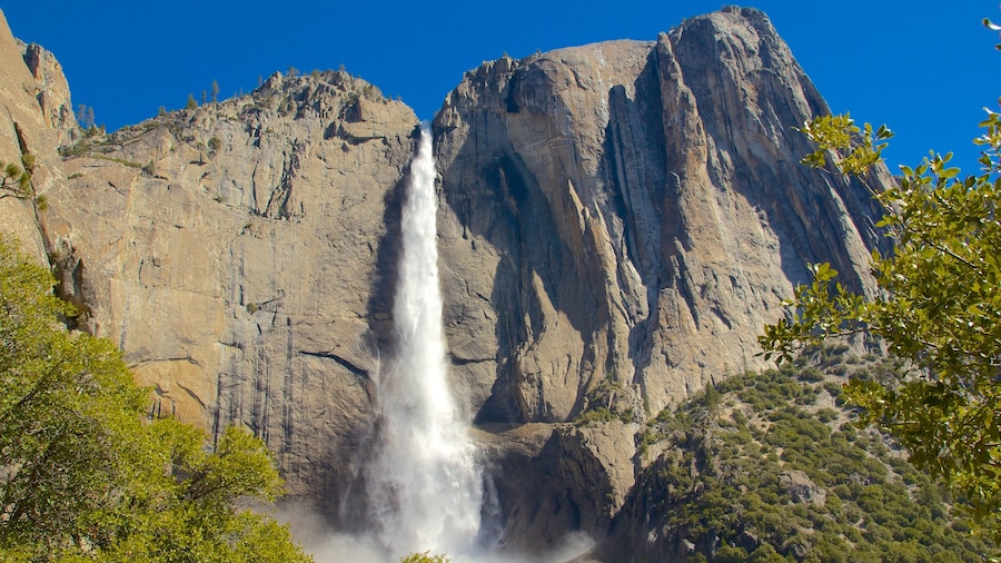 Yosemite Valley featuring a cascade and mountains