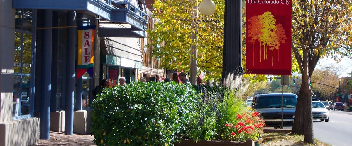 Old Colorado City featuring signage and street scenes