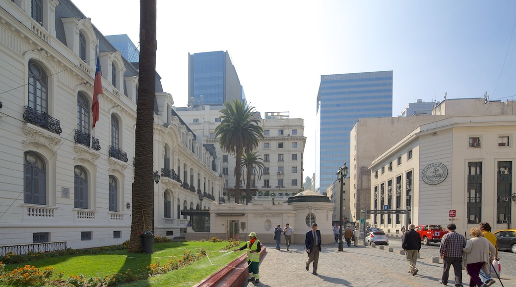 Teatro municipal de Santiago que incluye una ciudad y escenas urbanas