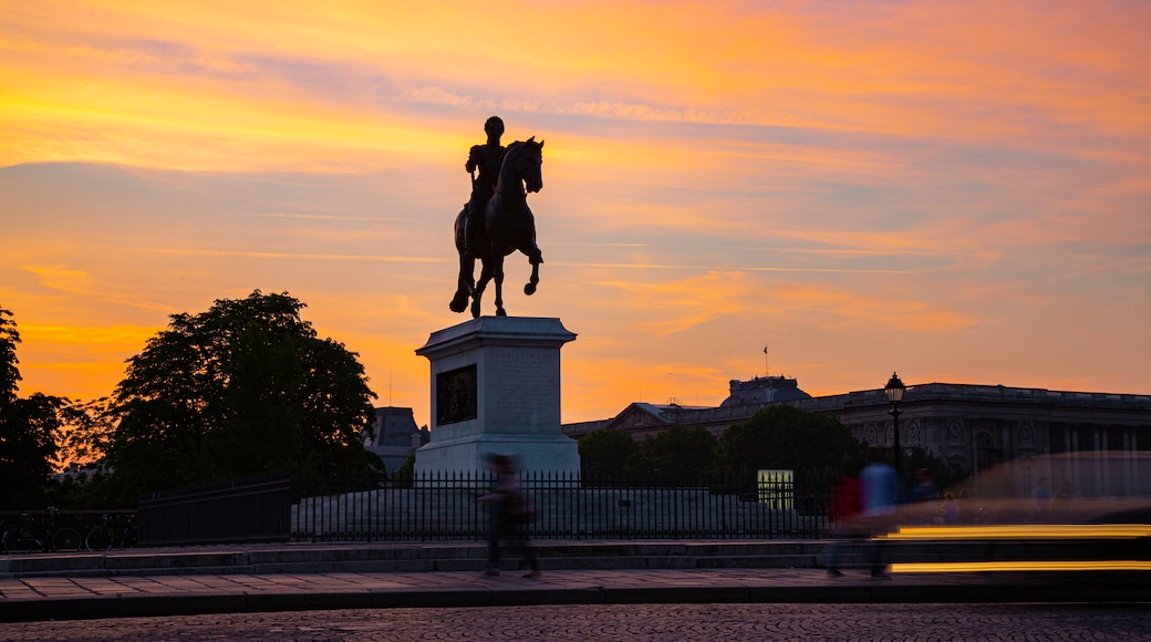 Pont Neuf showing a statue or sculpture and a sunset