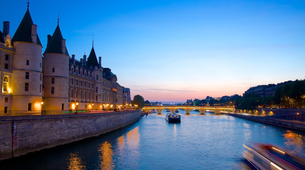 Pont Neuf featuring chateau or palace, heritage architecture and a river or creek