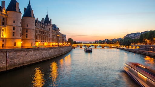 Pont Neuf which includes a sunset, a river or creek and heritage architecture