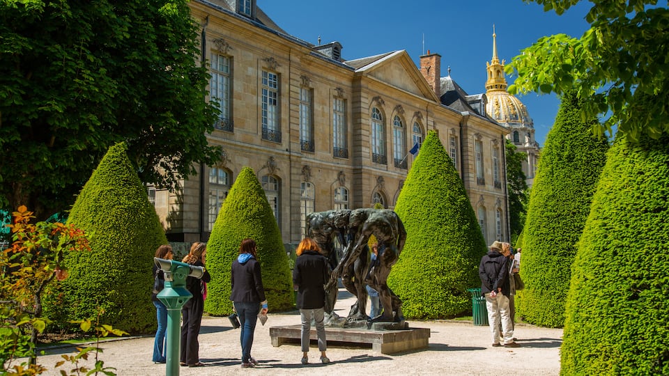 Paris which includes a garden and a statue or sculpture