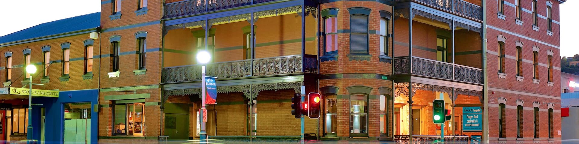 Burnie featuring a sunset and street scenes