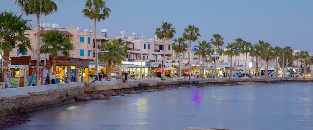 Paphos Harbour which includes a bay or harbour and a coastal town