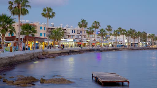 Paphos Harbour which includes a bay or harbour and a coastal town