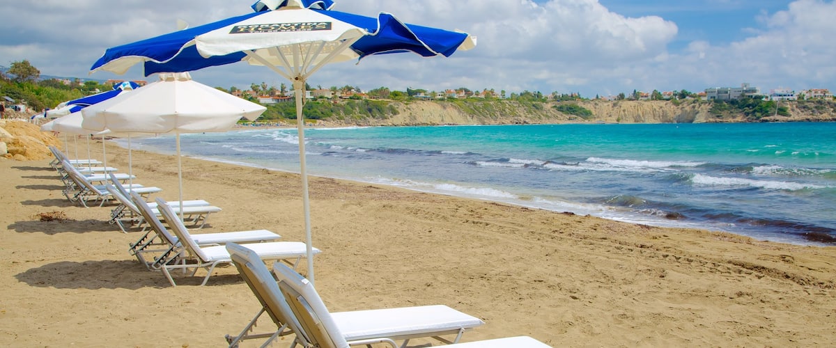 Coral Bay Beach which includes a sandy beach