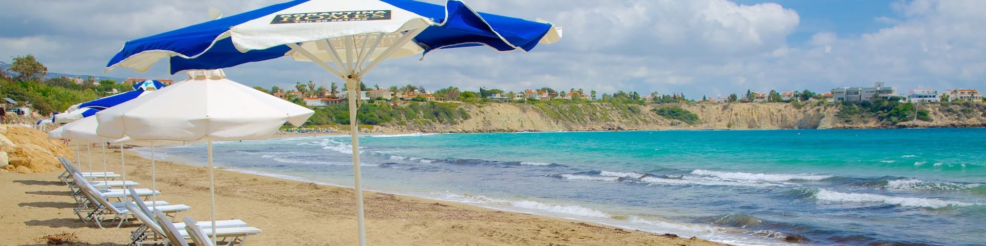 Korallenbucht welches beinhaltet Sandstrand