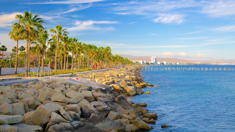 Limassol featuring rocky coastline and a sunset