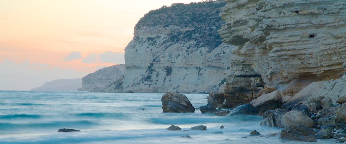 Cyprus showing a sunset and rugged coastline