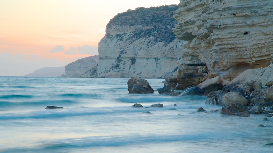 Cyprus featuring rugged coastline and a sunset