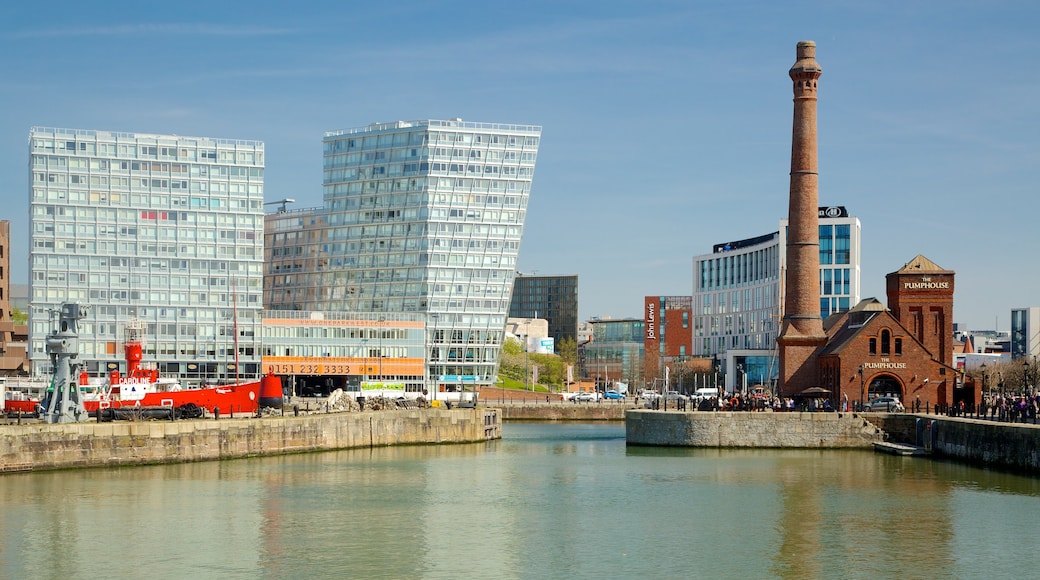 Albert Dock which includes modern architecture, a bay or harbour and a coastal town