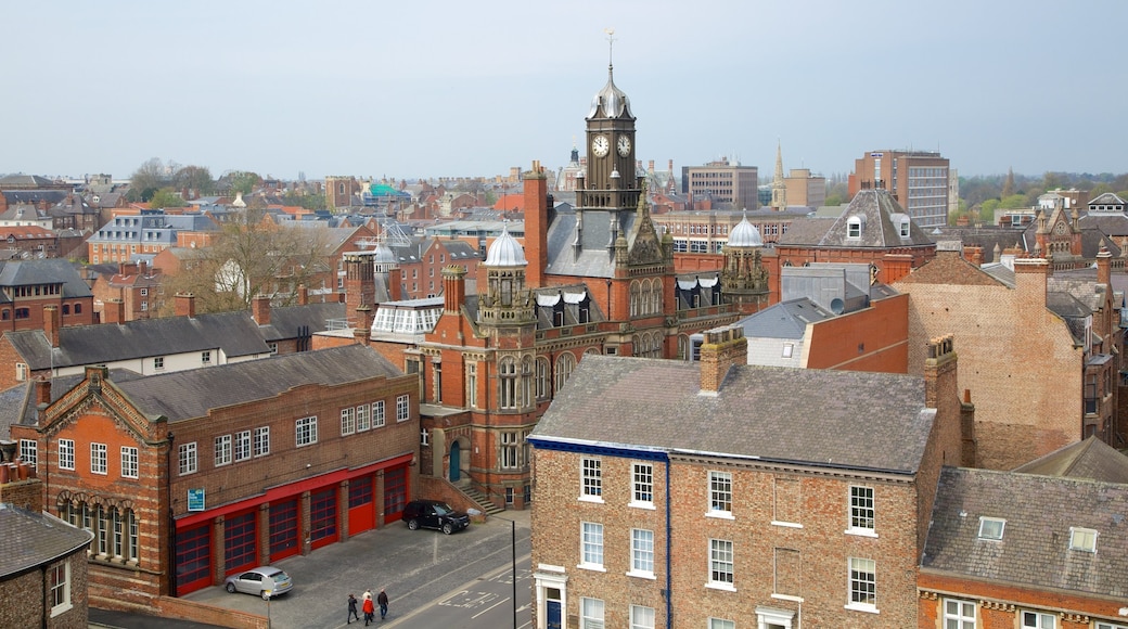 Clifford\'s Tower featuring heritage architecture and a city