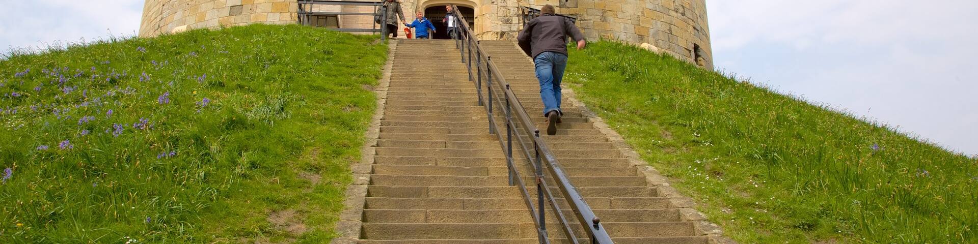 Clifford\'s Tower which includes a castle and heritage architecture