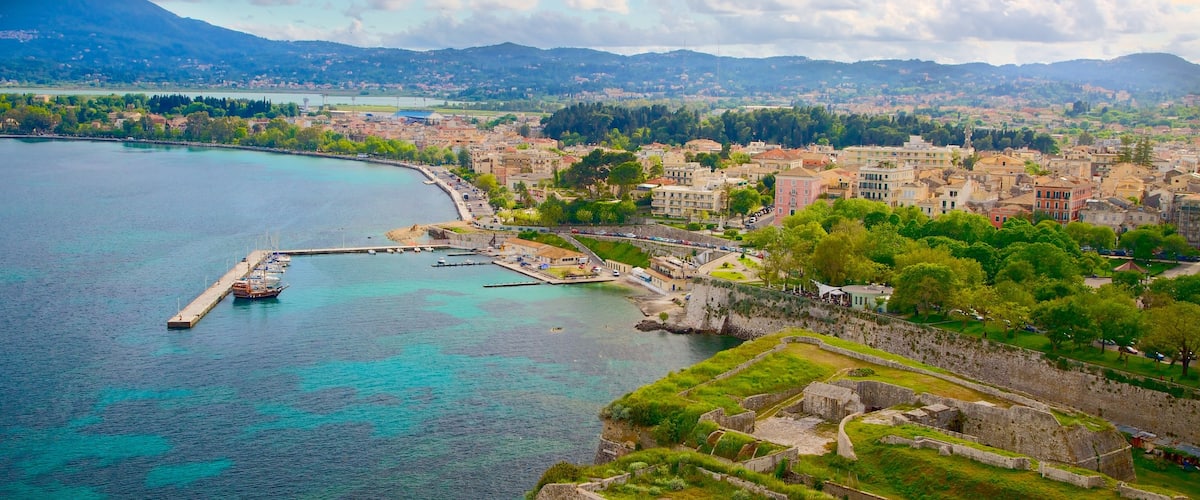 Corfu Town showing a bay or harbor and a coastal town