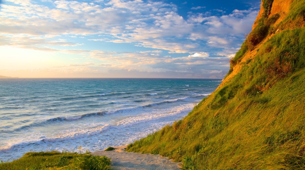 Sunset Beach which includes landscape views, general coastal views and a sunset