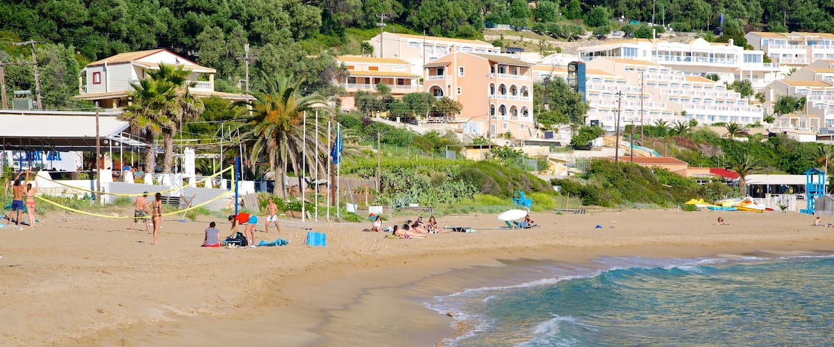 Playa de Pelekas mostrando vistas de paisajes, escenas tropicales y patrimonio de arquitectura
