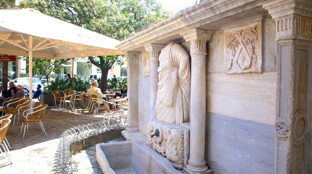 Bembo Fountain featuring a statue or sculpture