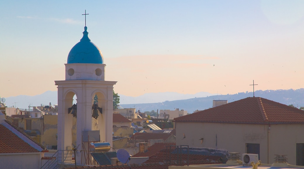 Chania featuring a city, a sunset and a church or cathedral