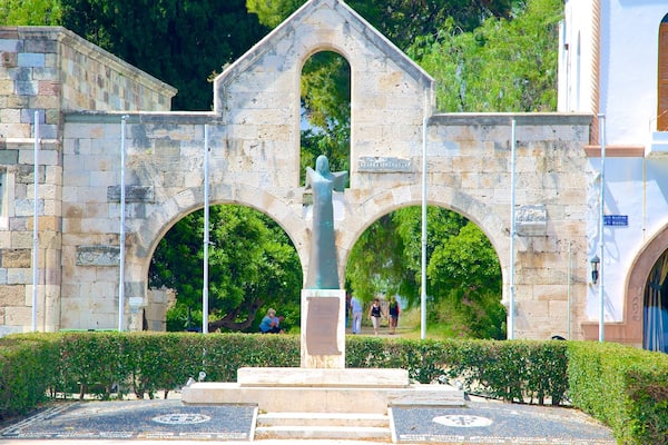 Kos featuring heritage architecture and a statue or sculpture