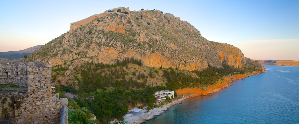 Arvanitia Beach showing general coastal views and a sunset