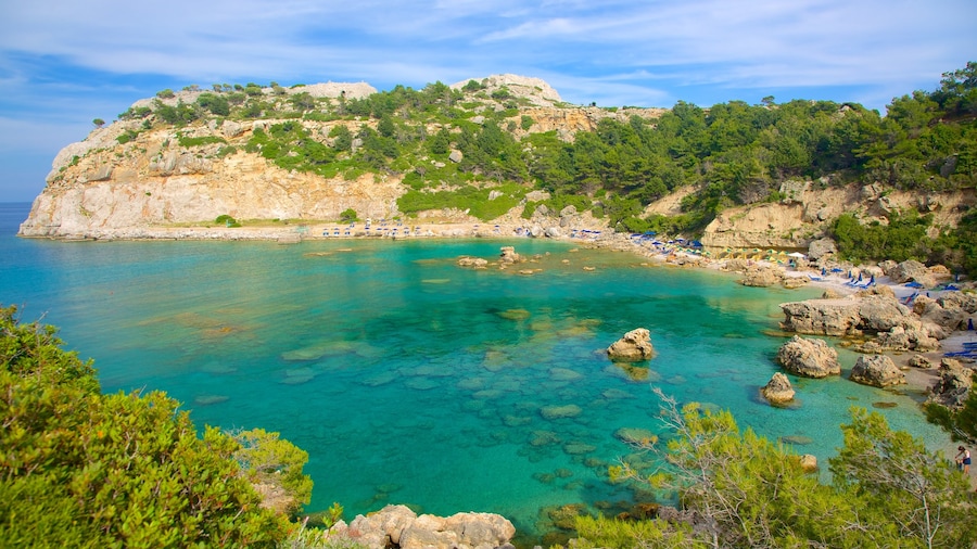 Anthony Quinn Bay which includes rocky coastline