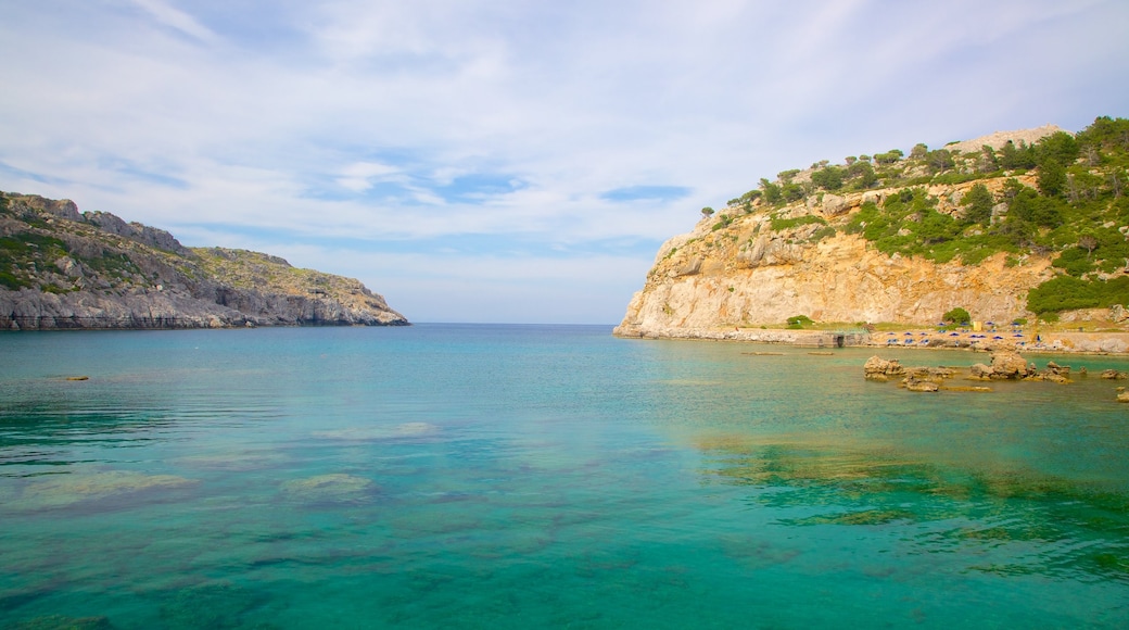 Anthony Quinn Bay which includes rocky coastline