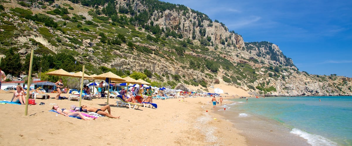 Tsambika Beach showing general coastal views, a beach and swimming