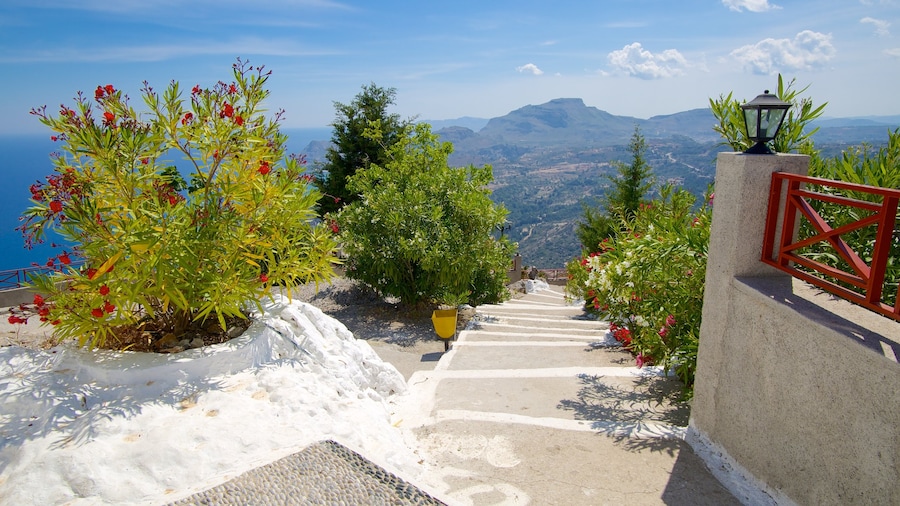 Tsambika Monastery featuring religious aspects, flowers and landscape views