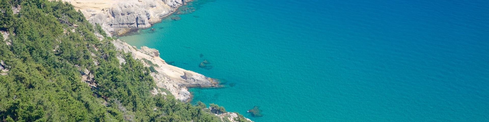 Tsambika Monastery showing rugged coastline and landscape views