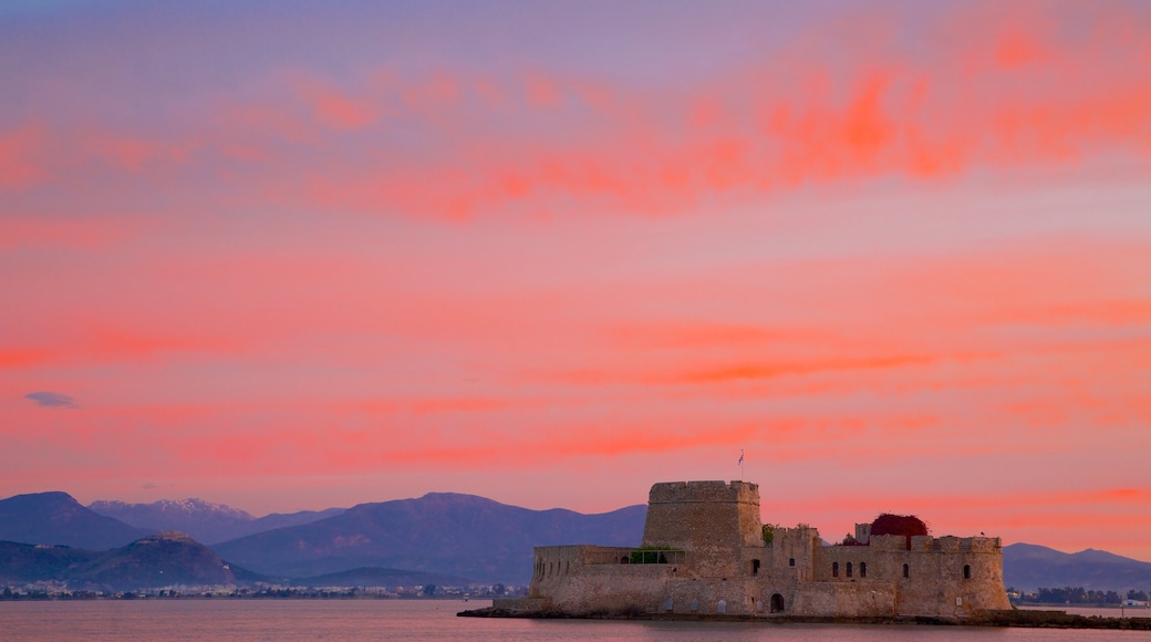 Greece showing a sunset and heritage architecture