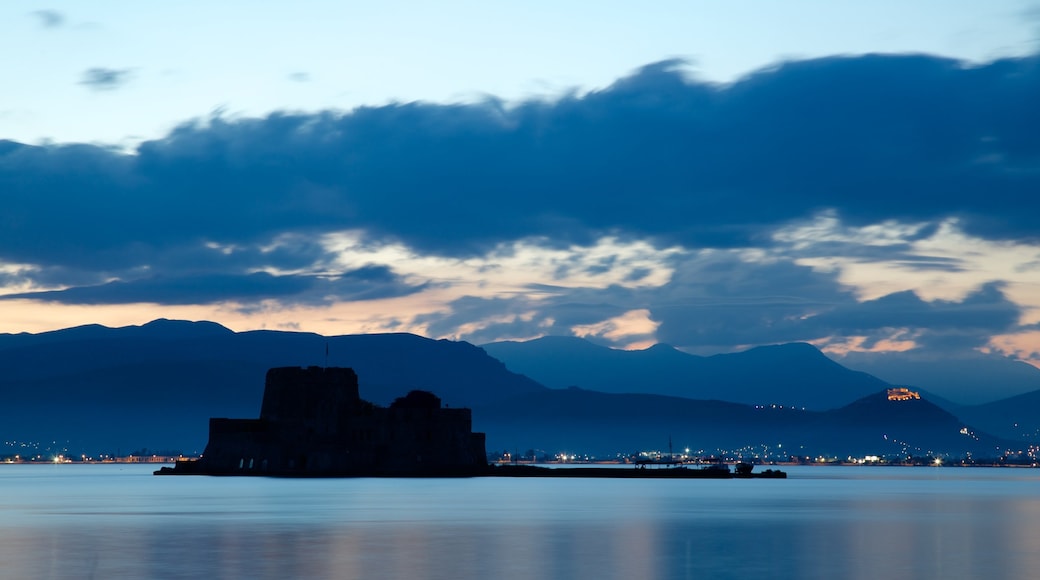 Castle of Bourtzi showing a sunset, chateau or palace and landscape views