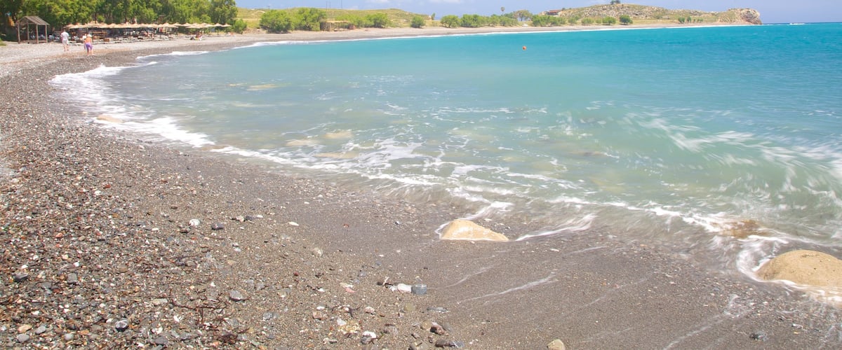 Agios Fokas Beach featuring a pebble beach