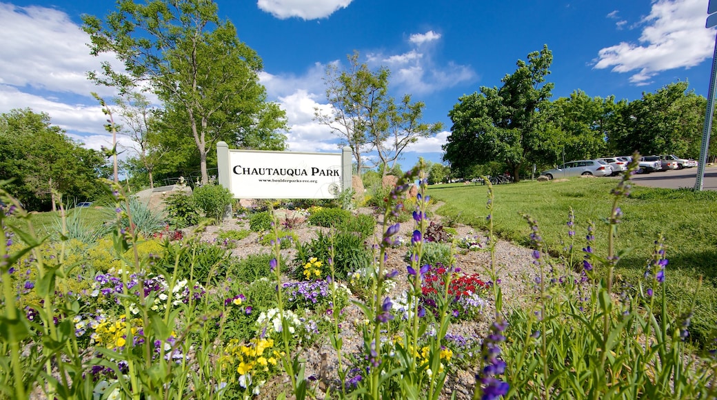 Chautauqua Park showing signage, a garden and flowers